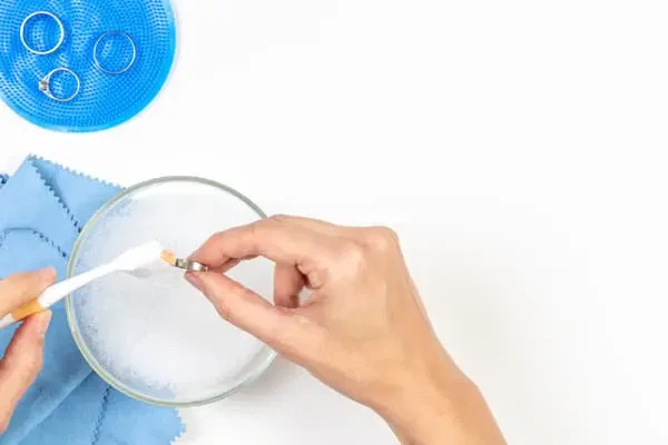 Penta Power Jewels cleaning with toothbrush and mild detergent